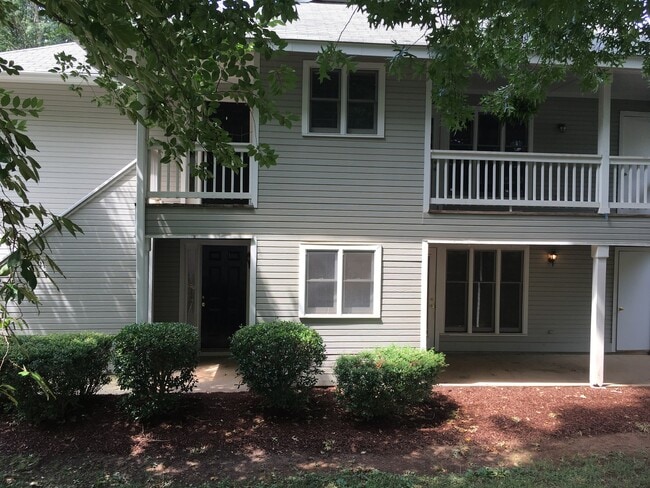 Building Photo - ONE LEVEL CONDO NEAR REX HOSPITAL -Firepla...