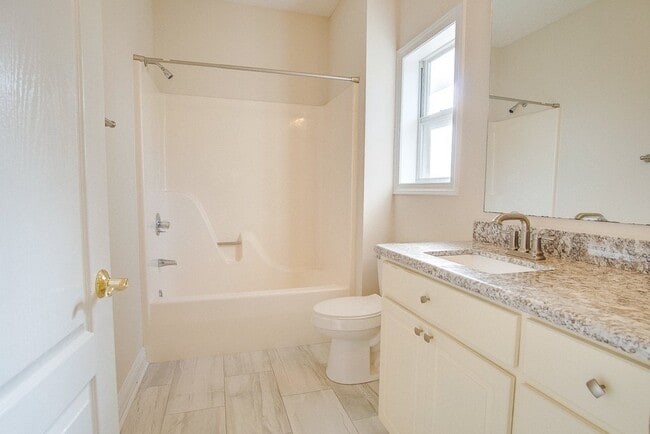 Building Photo - Festive Move-In Special! 4BR/3BA Lenox Gem – Fully Fenced Backyard & Military ½ Deposit