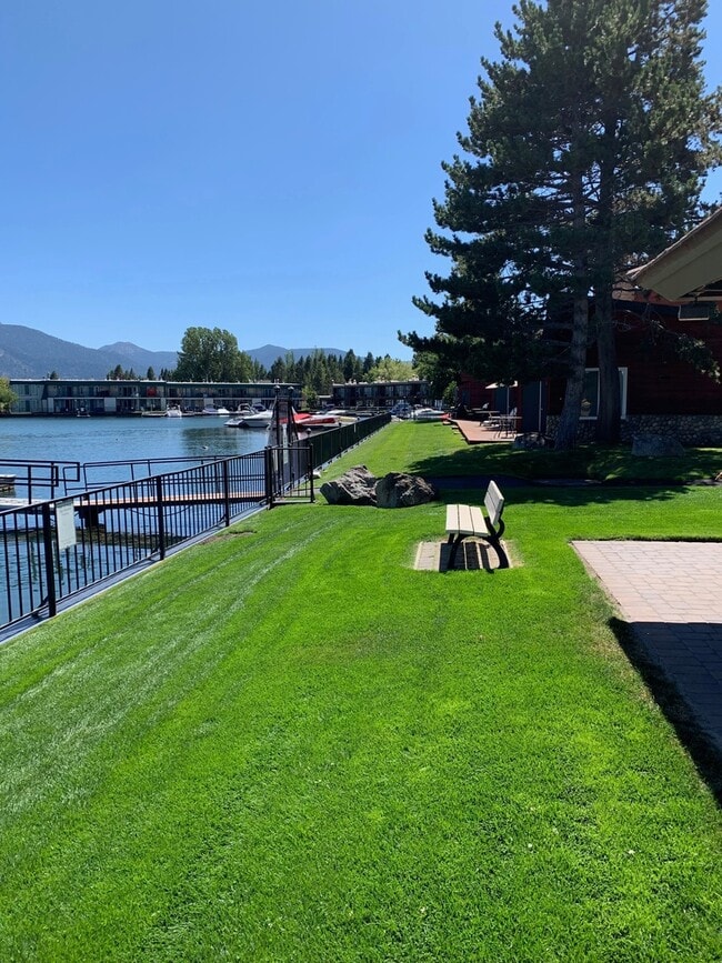 Building Photo - Secure your boat dock before summer!  Unfurnished 3 bed, 2 bath condo with marina and mountain vi...