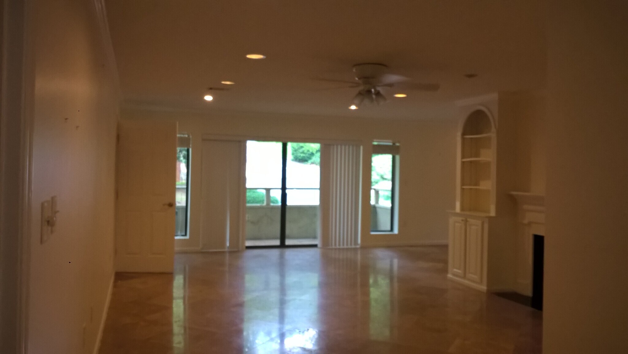 View of balcony is from foyer looking out to balcony - 25116 Plantation Dr NE