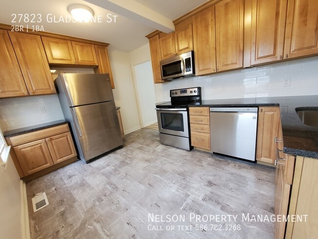 Building Photo - "2-Bedroom Gem with Granite Countertops & ...