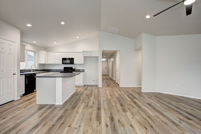 Building Photo - The 3 bedroom, 2 bedroom home also has a f...