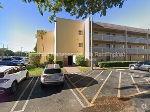 Building Photo - 6090 NW 64th Ave
