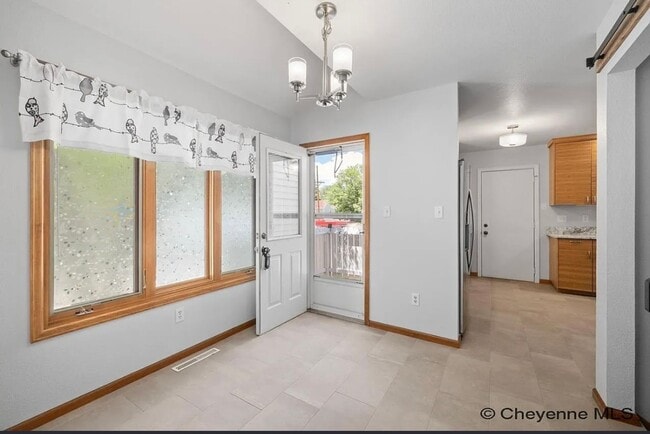 Building Photo - 3 BEDROOM, 2 BATHROOM TOWNHOME WITH 1 CAR ...