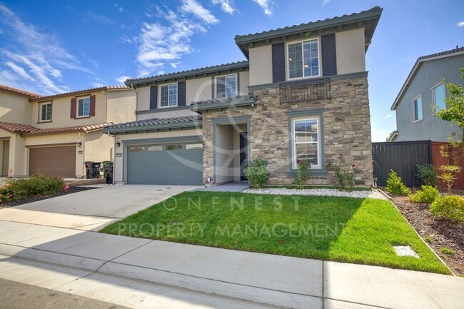 Building Photo - Stunning Modern Living in Twelve Bridges VIllage!