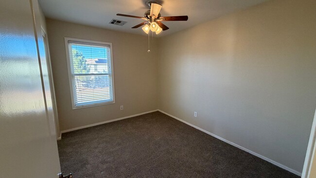 Building Photo - Spacious Surprise home with large backyard