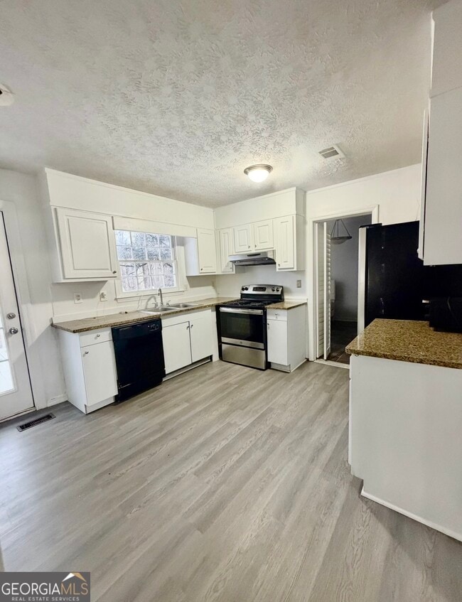 Building Photo - 975 Daisy Ct NW