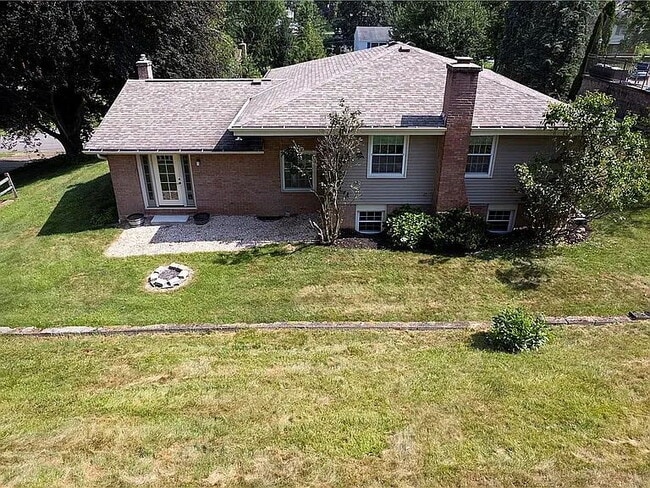 Building Photo - Charming 4-Bed Retreat with Finished Basem...