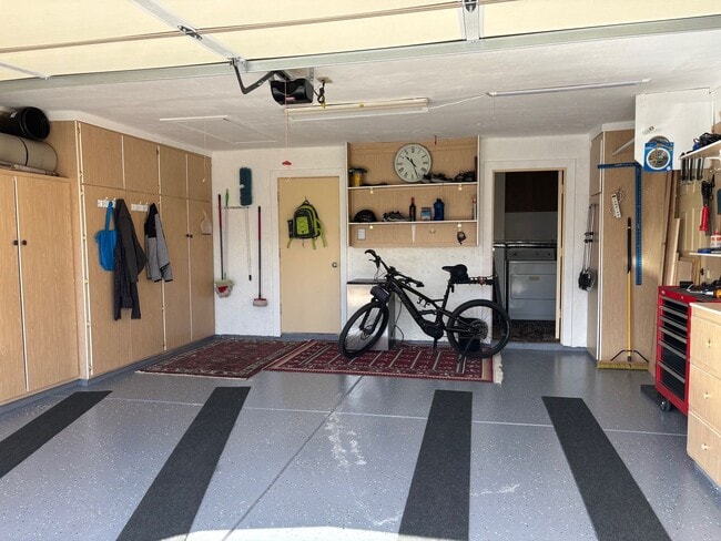 Building Photo - Welcome to this stunning updated 2-bedroom, 2-bathroom home on a lake located in the vibrant comm...