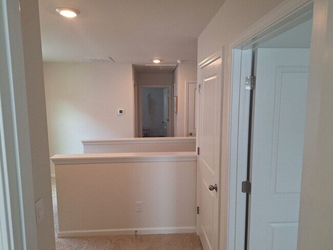 Building Photo - Lovely Four Bedroom Home  Appropriately 5 ...
