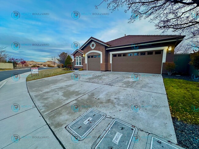 Building Photo - Open Kitchen, Expansive Living, and Covered Patio in Tranquil South Reno Near Trails, Parks & Sho...