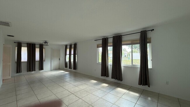 Building Photo - All inclusive 2BR/ 2B Condo in 55+ Community