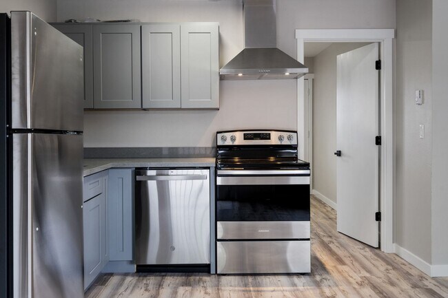 Building Photo - 2BR with dishwasher, on site laundry!