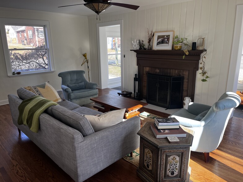 Living room with functioning wood burning fireplace - 2716 Keystone Ave