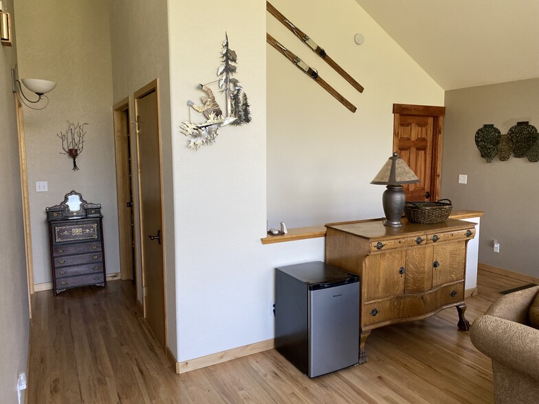 Upstairs hallway to 1/2 bath - 588 Lake View Cir W