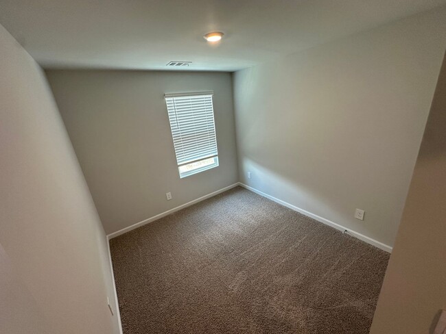 Building Photo - Brand New Construction Townhome with Pool!