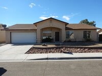 Building Photo - Four Bedroom Mountain View Home with large fenced back yard and double gates