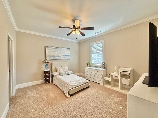 Building Photo - Luxurious 3BD, 4BA Raleigh Townhome with a First Floor Master Bedroom, Bonus Sunroom, and Large U...