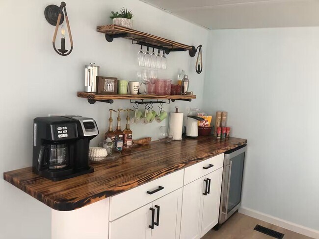 Building Photo - This FULLY FURNISHED ALL INCLUSVIE HOME IS...