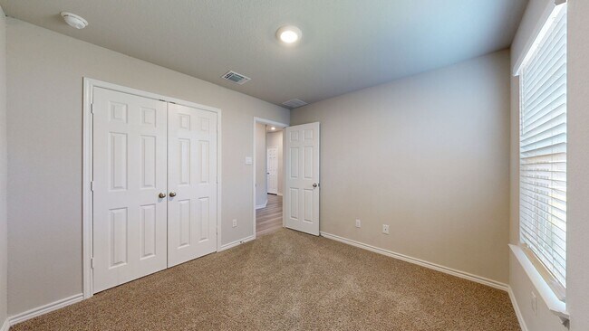 Building Photo - Discover this spacious 4-bedroom, 2-bath home with 3 CAR GARAGE!!!