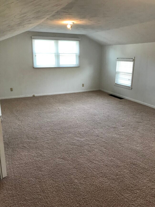 Loft room above the garage. Has previously been used as playroom or office - 1202 9th St W