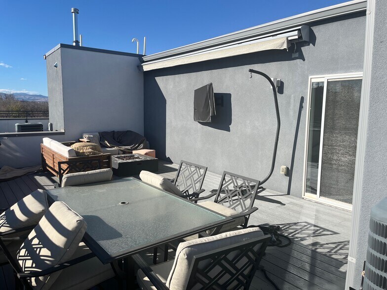 retractable roof and tv on rooftop - 3326 S Washington St