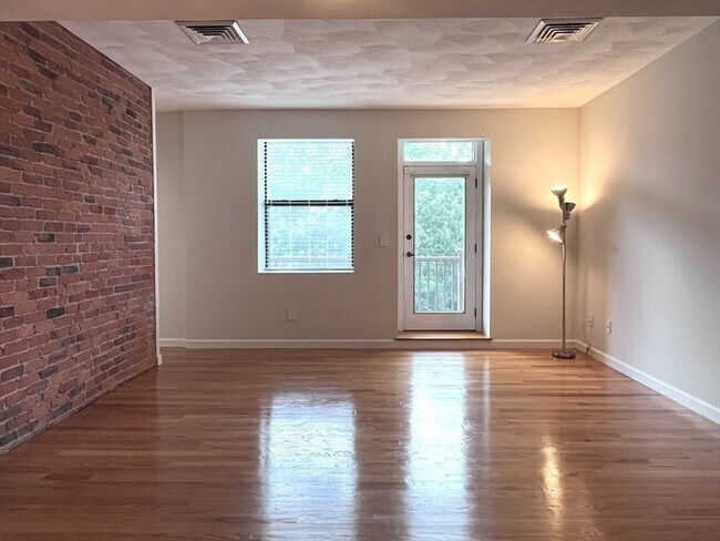 Building Photo - Updated 2BR / 2BA Condo with Private Deck & In-Unit Laundry at Academy Park