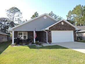 Building Photo - Almost new four bedroom home with solar pa...