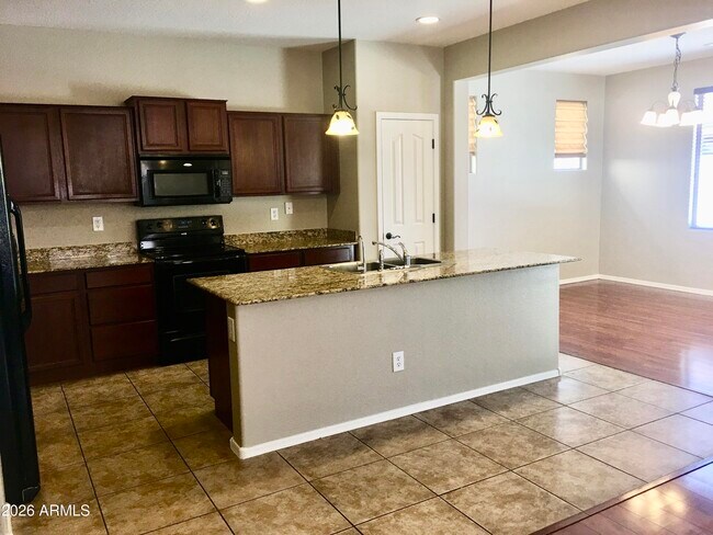Building Photo - 3271 E Carla Vista Dr