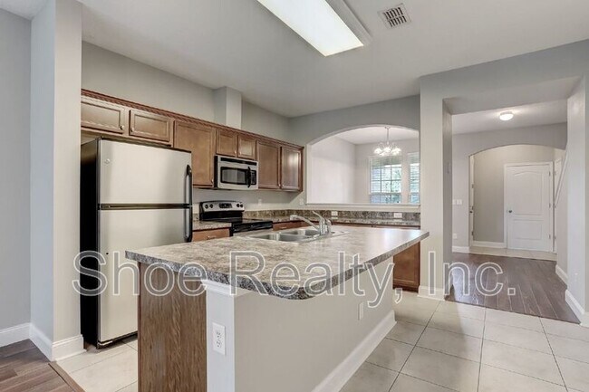 Building Photo - 4220 Plantation Oaks Blvd