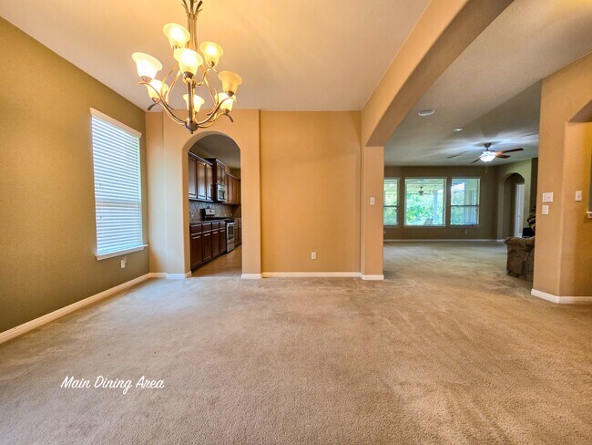 formal dining area exudes elegance and sophistication, perfect for hosting dinner parties and family - 301 Silver Trl