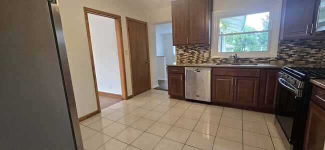Building Photo - 8607 N Osceola Ave