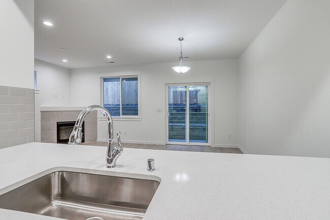 Building Photo - Modern Living in the Heart of Ridgefield: Quartz Finishes & Open-Concept Charm