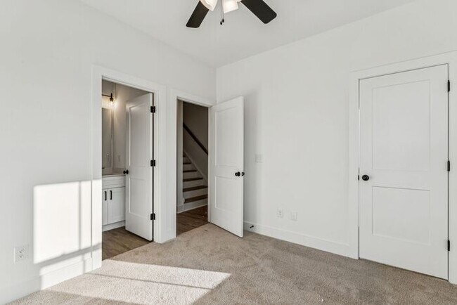 Building Photo - High-End 2BR Townhome | Rooftop Terrace + 2-Car Garage | 24-Unit Community