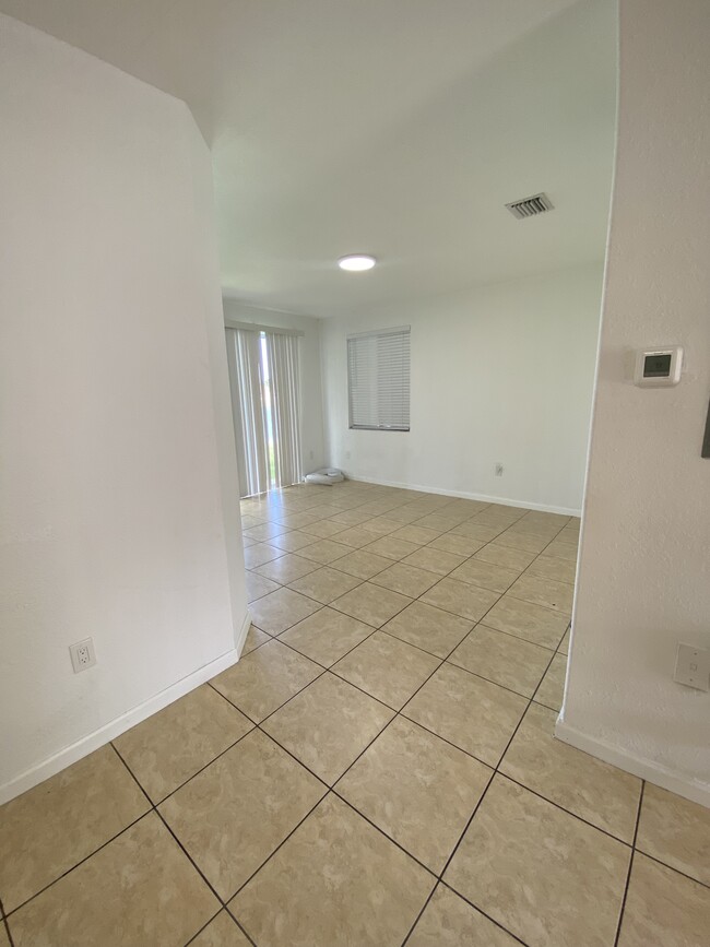 Spacious living room with beautiful view of pond - 2451 SE 14th Ave