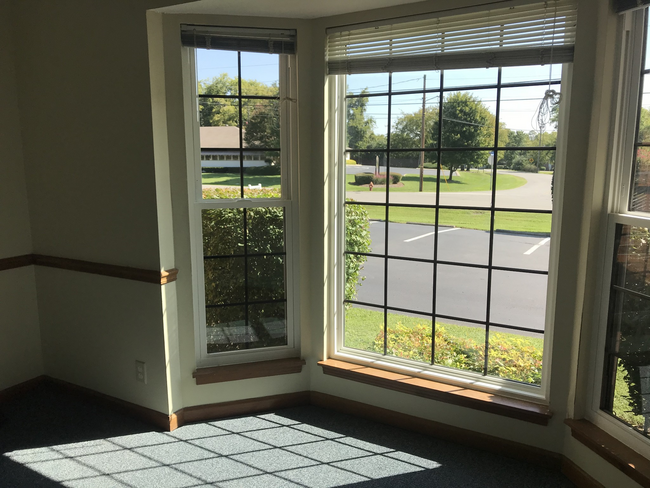 Front office with new bay windows - 841 Wren Rd Ste 4