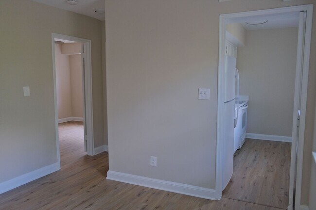 Building Photo - Beautiful corner unit in a secure, all-brick, pet-friendly building