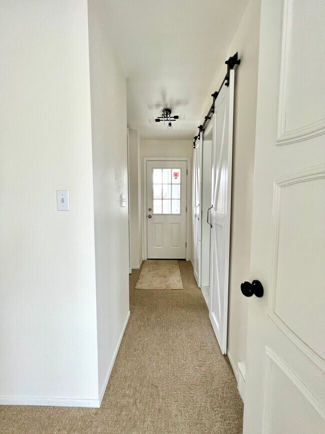 Master Bedroom Hallway to Walk-in Closet, Balcony, and Bathroom - 3268 S Oneida Way