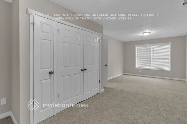 Building Photo - 6017 Happy Trails Ct