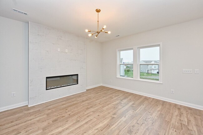 Building Photo - **BE THE LUCKY ONE TO LIVE IN THIS 2024-BUILT TOWNHOME**