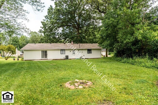 Building Photo - 6718 Raintree Rd