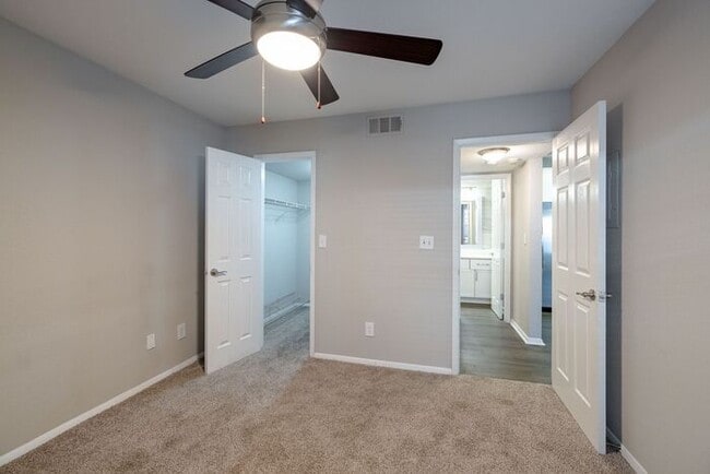 Building Photo - Spacious 2-Bedroom Elite Apartment with Private Balconies & Washer/Dryer