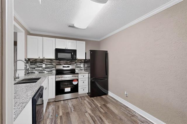 Building Photo - 2200 E Trinity Mls Rd