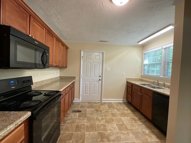 Building Photo - 2br,1ba w/ carport and detached storage bu...