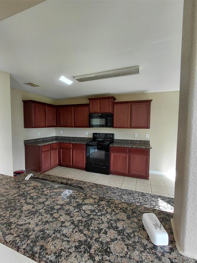 Building Photo - 8902 Stagewood Dr