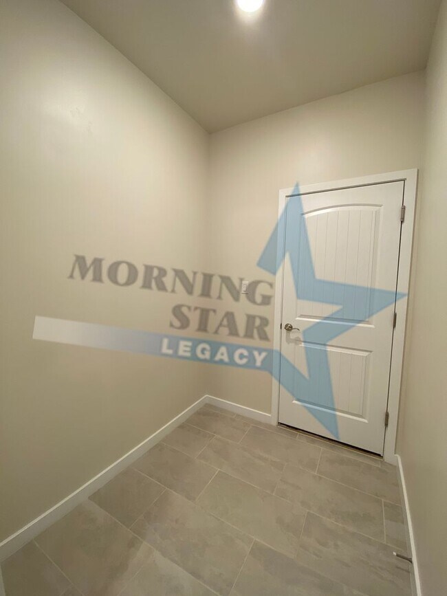 Building Photo - NEW CONSTRUCTION AND FULLY LOADED