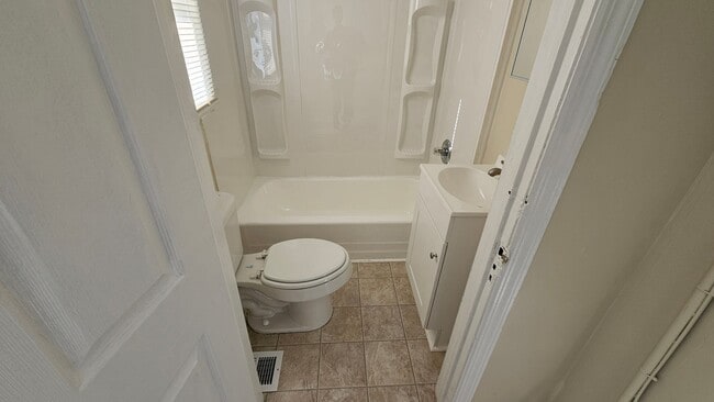 Building Photo - JUST REDUCED!  Ask About Move In Incentives!  3 Bedroom Duplex in Quiet Location