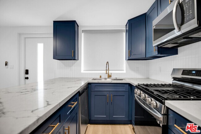 Building Photo - 1021 N Genesee Ave