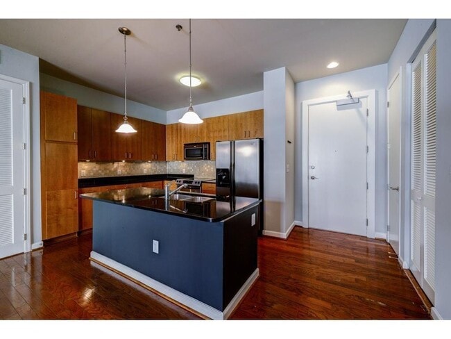 Building Photo - 711 Cosmopolitan Dr NE