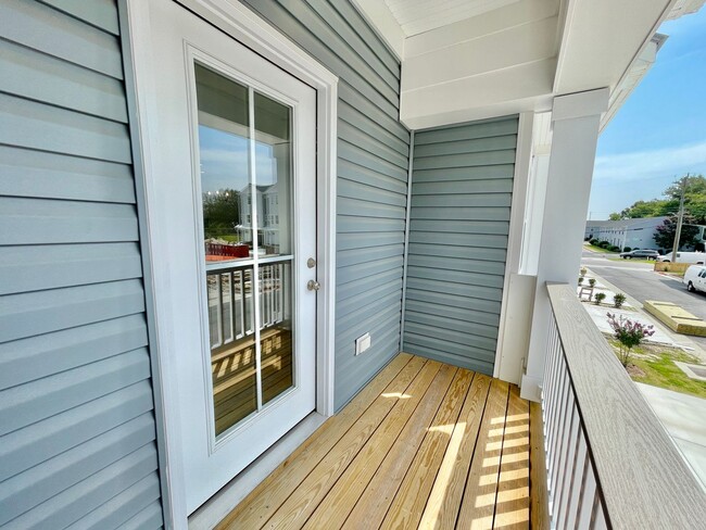 Building Photo - Practically New & Available NOW! Americana...